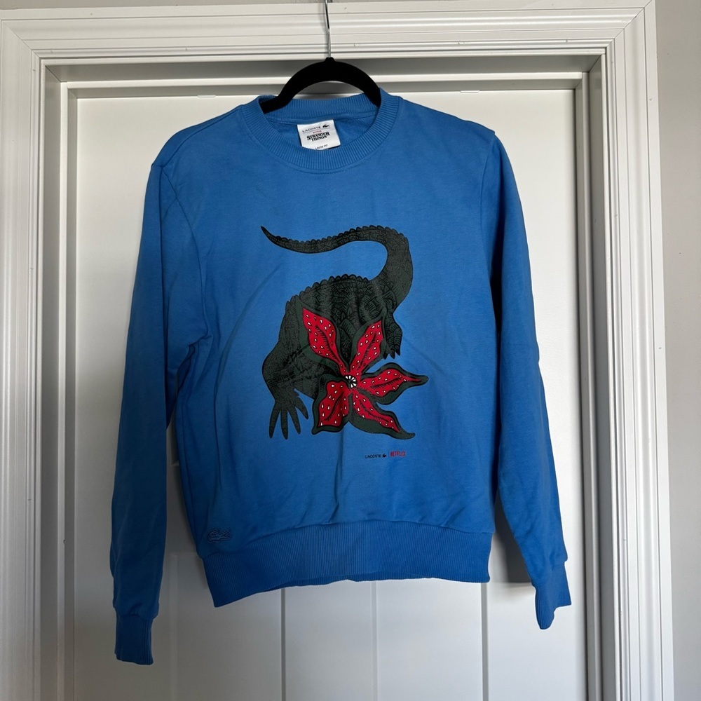 LACOSTE X NETFLIX STRANGER THINGS FLEECE SWEATSHIRT - Picture 2 of 6